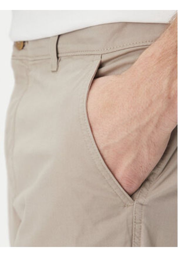 Calvin Klein Jeans Chinosy LV040EM628 Beżowy Slim Fit. Kolor: beżowy. Materiał: bawełna