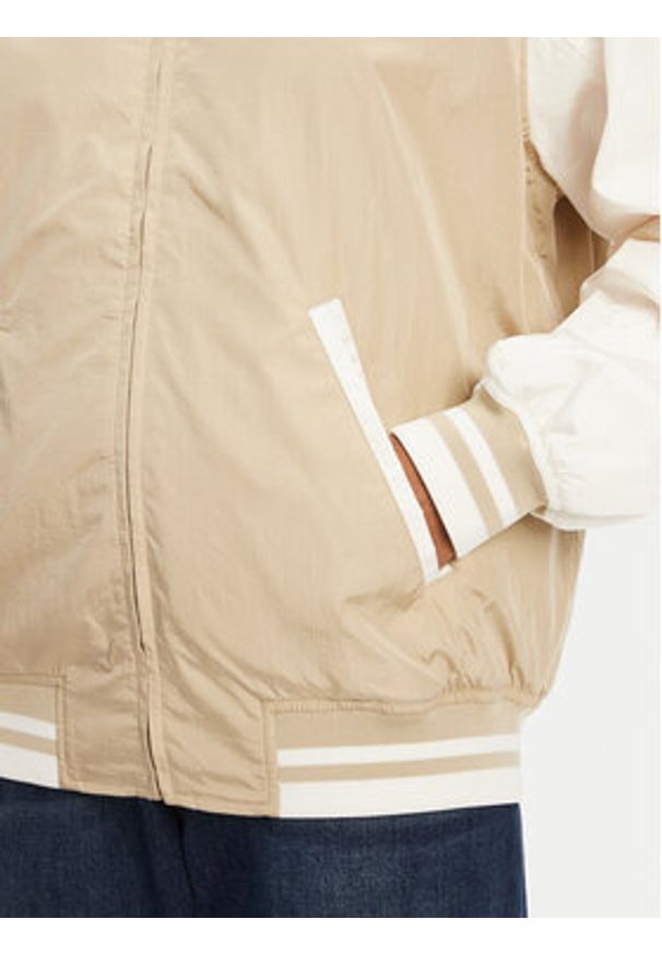 Tommy Jeans Kurtka bomber Souvenir DW0DW21432 Beżowy. Kolor: beżowy. Materiał: syntetyk