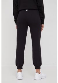 Calvin Klein Jeans spodnie dresowe bawełniane J20J218703.PPYY damskie kolor czarny z nadrukiem. Stan: podwyższony. Kolor: czarny. Materiał: bawełna, dresówka. Wzór: nadruk #5