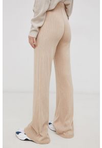 only - Only Spodnie damskie kolor beżowy dzwony high waist. Stan: podwyższony. Kolor: beżowy. Materiał: materiał #4
