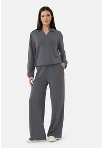 Volcano - Spodnie dresowe z szeroką nogawką N-ERLA. Materiał: dresówka. Wzór: gładki #1