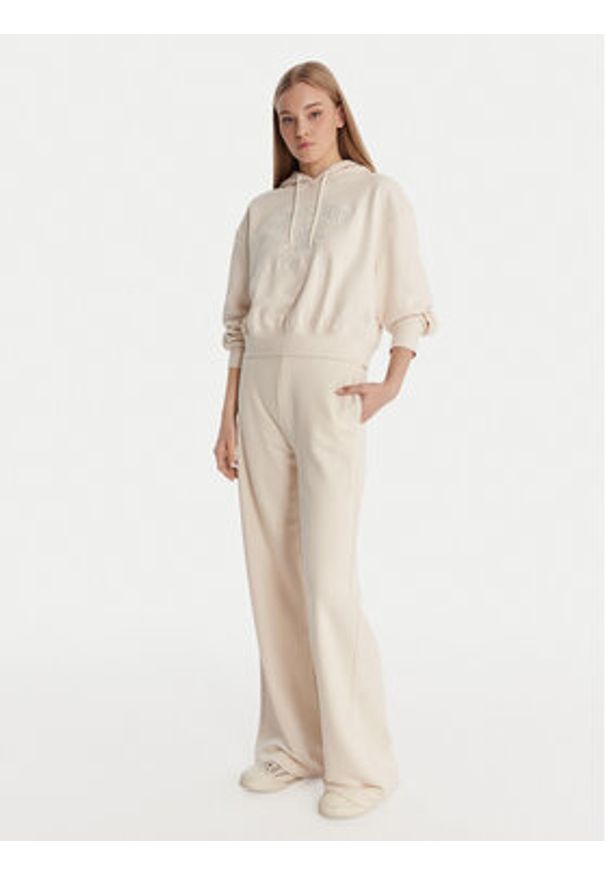 Guess Spodnie dresowe V6RB03 KD761 Kremowy Wide Leg. Kolor: kremowy. Materiał: bawełna
