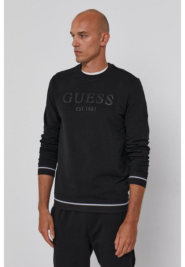 Guess - Bluza. Okazja: na co dzień. Kolor: czarny. Wzór: nadruk. Styl: casual