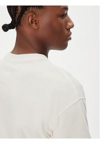 Nike T-Shirt HJ0746 Écru Regular Fit. Materiał: bawełna