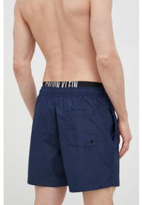Calvin Klein szorty kąpielowe kolor granatowy. Kolor: niebieski. Materiał: tkanina, poliester, materiał. Wzór: nadruk #4