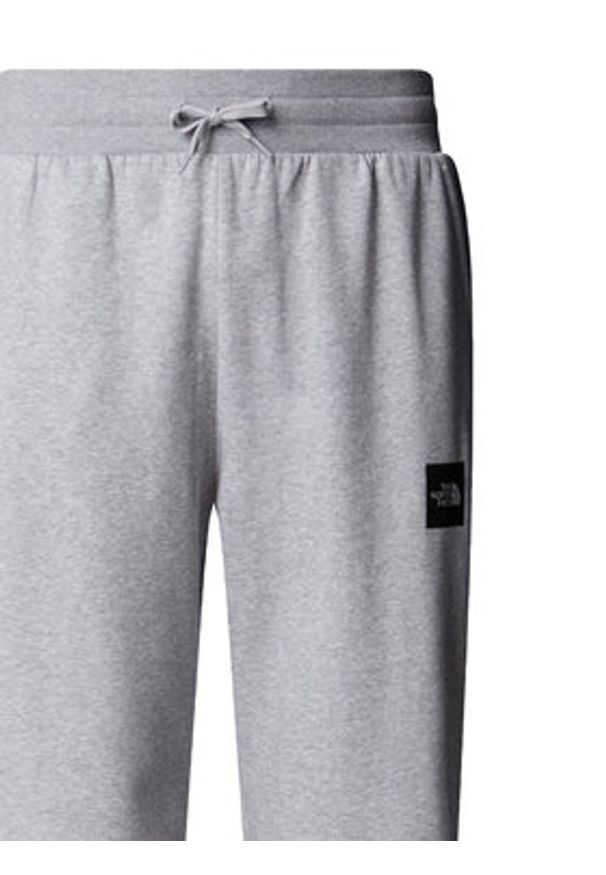The North Face Spodnie dresowe Fine NF0A8C1K Szary Tapered Fit. Kolor: szary. Materiał: syntetyk