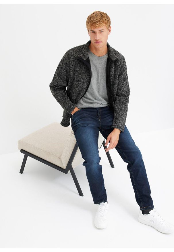 bonprix - Dżinsy ze stretchem Slim Fit Tapered. Kolor: niebieski