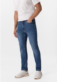 Volcano - Niebieskie jeansy, Slim Fit, D-DEXTER 52. Kolor: niebieski. Styl: klasyczny