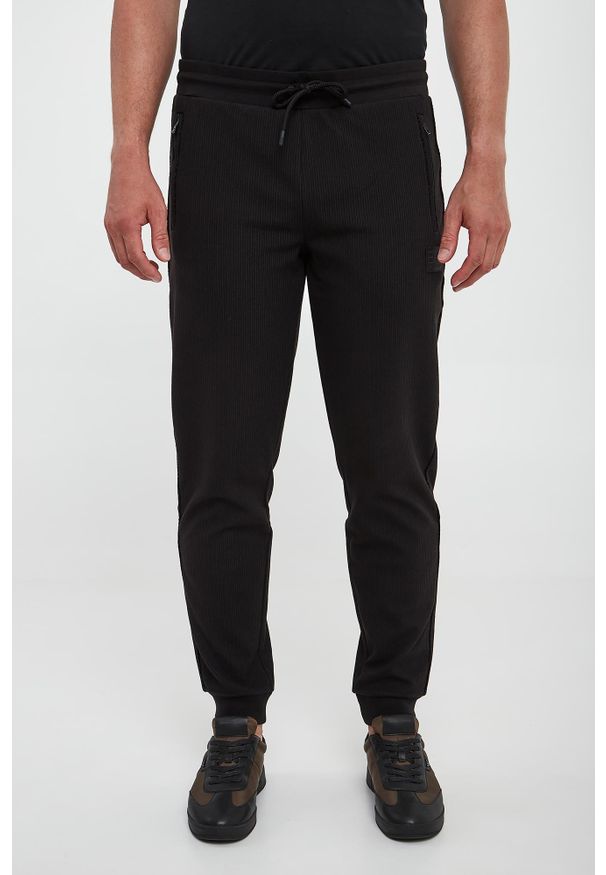 EA7 Emporio Armani - Spodnie dresowe męskie EA7 EMPORIO ARMANI. Materiał: dresówka