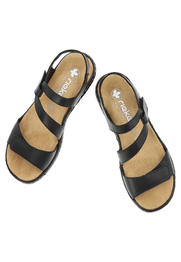 Czarne Sandały Rieker Modne Obuwie Damskie. Okazja: na co dzień. Zapięcie: rzepy. Kolor: czarny. Materiał: materiał. Wzór: paski. Sezon: lato. Obcas: na koturnie. Styl: casual, elegancki, klasyczny, wizytowy
