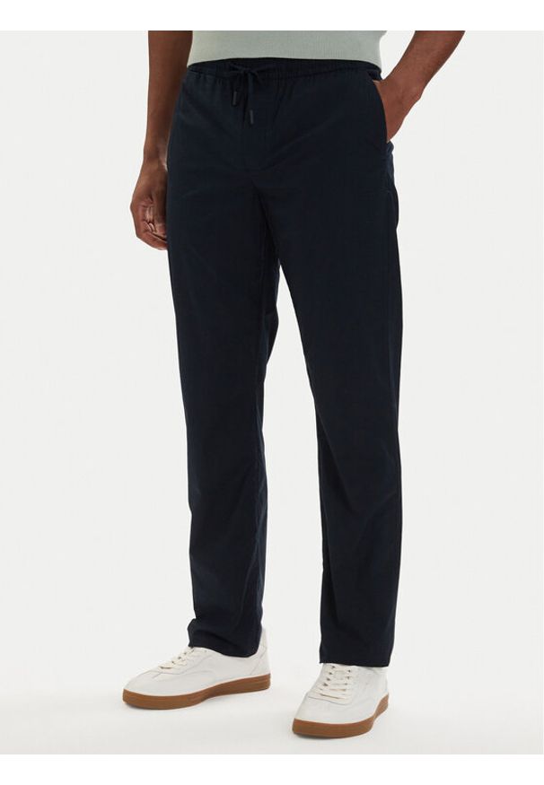 TOMMY HILFIGER - Tommy Hilfiger Chinosy Denton MW0MW42340 Granatowy Slim Fit. Kolor: niebieski. Materiał: bawełna