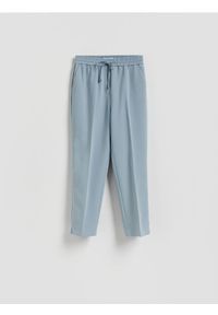 Reserved - Spodnie z kantem - jasnoniebieski. Kolor: niebieski. Materiał: wiskoza, tkanina #1