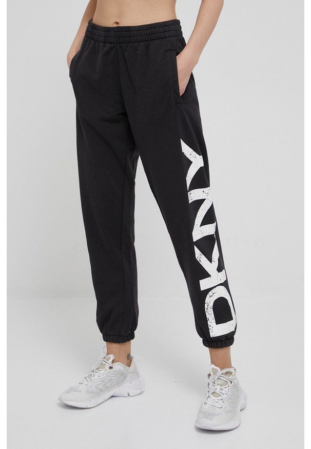 DKNY - Dkny spodnie DP1P2833 damskie kolor czarny z nadrukiem. Kolor: czarny. Wzór: nadruk