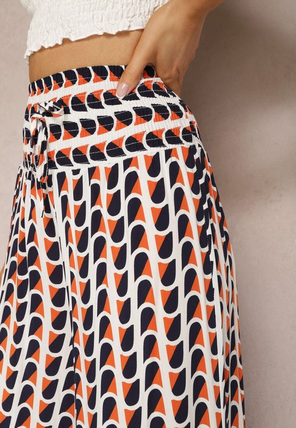 Renee - Pomarańczowo-Granatowe Spodnie z Wiskozy High Waist Typu Palazzo z Gumką w Talii Tiimacella. Okazja: na co dzień, na randkę. Stan: podwyższony. Kolor: pomarańczowy. Materiał: wiskoza. Styl: casual, elegancki