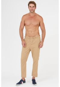 7 FOR ALL MANKIND Beżowe spodnie męskie jogger Chino. Kolor: beżowy. Materiał: bawełna