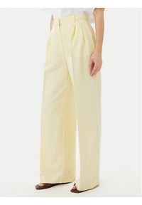 TOMMY HILFIGER - Tommy Hilfiger Spodnie materiałowe WW0WW45460 Żółty Relaxed Fit. Kolor: żółty. Materiał: len