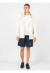 TOMMY HILFIGER - Tommy Jeans Kurtka | DM0DM12442 | Mężczyzna | Kremowy. Okazja: na co dzień. Typ kołnierza: kaptur. Kolor: kremowy. Materiał: poliamid. Wzór: aplikacja. Styl: casual