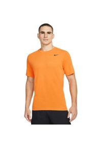 Koszulka treningowa męska Nike Crew Solid. Kolor: pomarańczowy. Materiał: poliester. Długość rękawa: krótki rękaw. Długość: krótkie