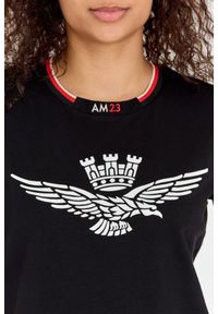 Aeronautica Militare - AERONAUTICA MILITARE Czarny luźny t-shirt damski z wypukłym orłem Comfort Fit. Kolor: czarny. Materiał: bawełna #3
