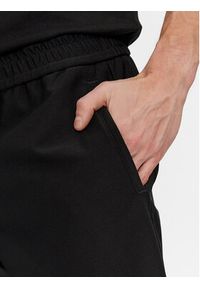 BOSS - Boss Spodnie dresowe T_Flex 50500615 Czarny Tapered Fit. Kolor: czarny. Materiał: syntetyk #3