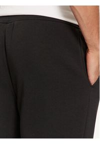 Calvin Klein Spodnie dresowe K10K113654 Czarny Regular Fit. Kolor: czarny. Materiał: bawełna