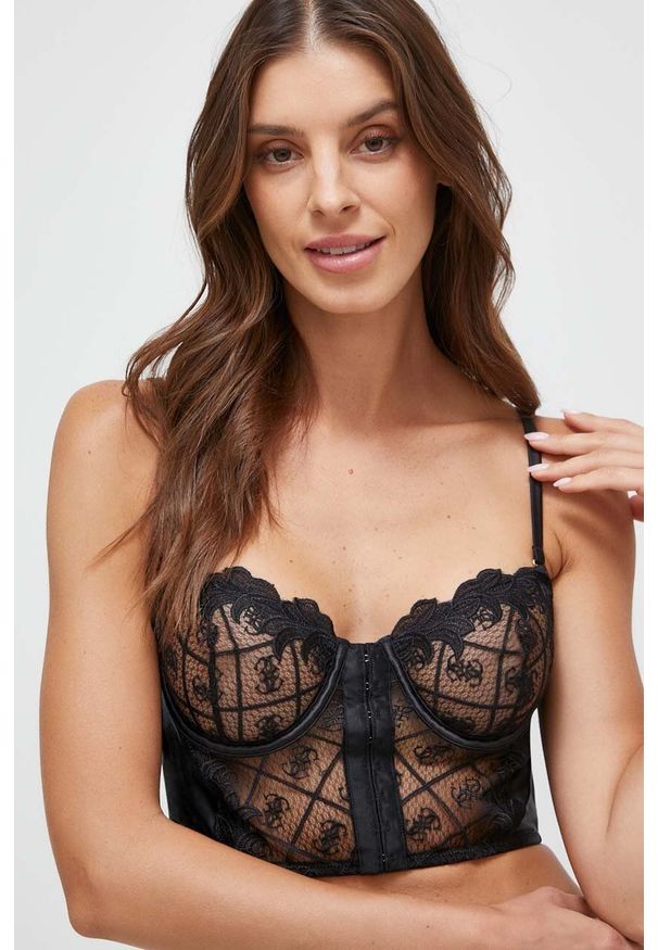 Guess biustonosz kolor czarny koronkowy gładki. Kolor: czarny. Materiał: koronka. Rodzaj stanika: różne sposoby noszenia, biustonosz z fiszbinami, odpinane ramiączka. Wzór: gładki