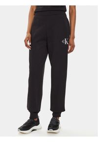 Calvin Klein Jeans Spodnie dresowe Monologo J20J223590 Czarny Relaxed Fit. Kolor: czarny. Materiał: bawełna