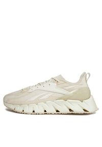 Reebok Sneakersy Zig Kinetica 3 IG2746 Beżowy. Kolor: beżowy. Materiał: materiał