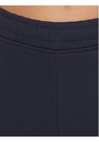 Tommy Jeans Spodnie dresowe DW0DW16379 Granatowy Relaxed Fit. Kolor: niebieski. Materiał: bawełna