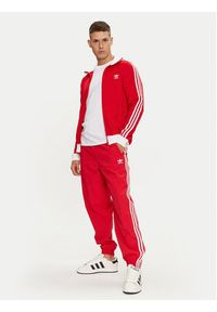 Adidas - adidas Spodnie dresowe Adicolor Woven Firebird IT2498 Czerwony Regular Fit. Kolor: czerwony. Materiał: syntetyk