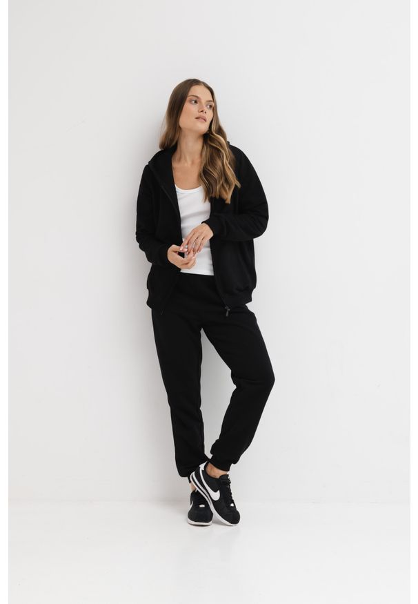 LEKKIE SPODNIE CELINE CZARNE XS - Flawless. Okazja: na co dzień. Kolor: czarny. Materiał: guma, skóra, dresówka, bawełna, elastan. Styl: klasyczny, casual