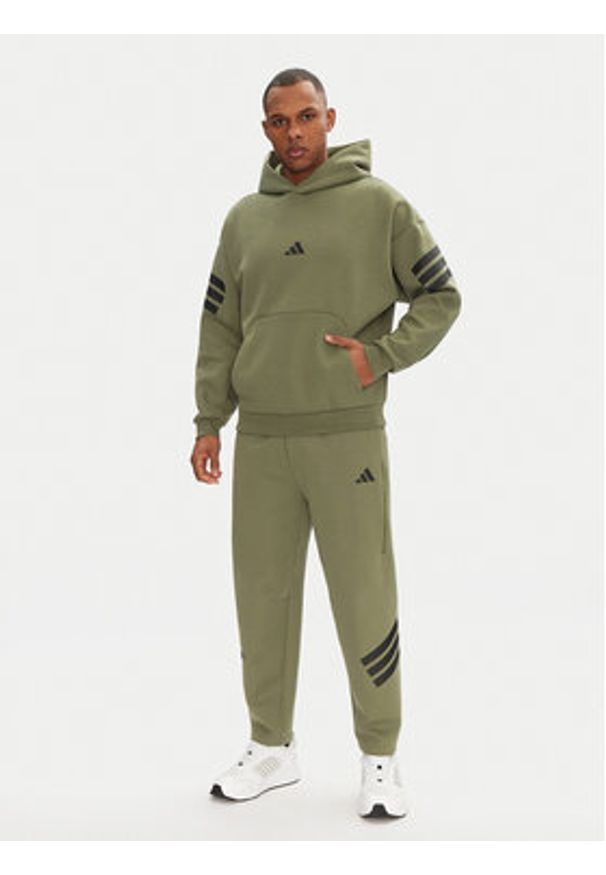Adidas - adidas Spodnie dresowe Future Icons 3-Stripes JD4891 Zielony Loose Fit. Kolor: zielony. Materiał: bawełna