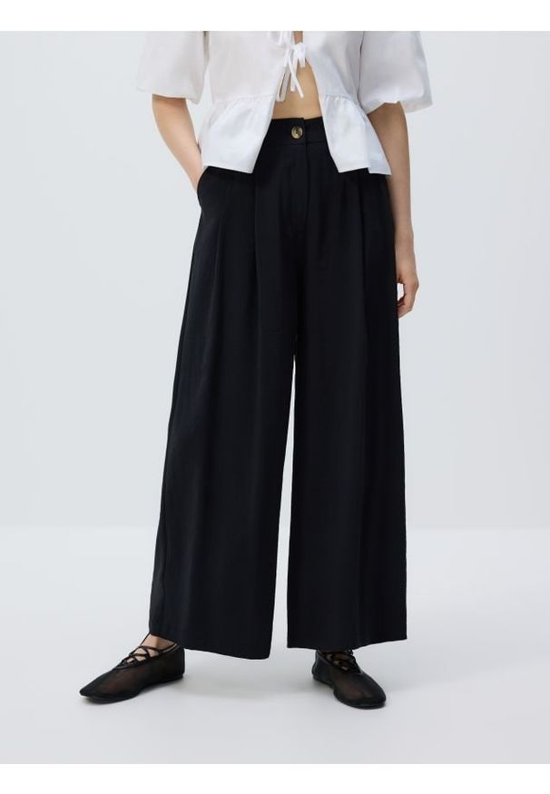 Reserved - Szerokie spodnie z modalu - czarny. Kolor: czarny