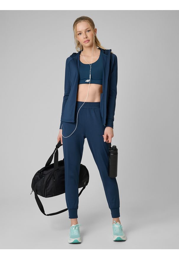 4f - 4F Spodnie treningowe szybkoschnące damskie - turkusowe XS. Kolor: turkusowy. Materiał: materiał, elastan. Sport: fitness