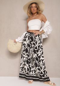Renee - Czarne Spodnie o Szerokim Kroju High Waist w Kwiaty Nelrive. Okazja: na co dzień, na spacer. Stan: podwyższony. Kolor: czarny. Wzór: kwiaty. Styl: klasyczny, elegancki, casual #3