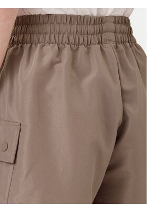 Adidas - adidas Szorty sportowe Essentials Woven JD0790 Beżowy Loose Fit. Kolor: beżowy. Materiał: syntetyk