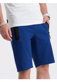 Ombre Clothing - Krótkie spodenki męskie dresowe - niebieskie V1. Okazja: na co dzień. Kolor: niebieski. Materiał: dresówka. Długość: krótkie. Wzór: nadruk. Sezon: wiosna, lato. Styl: klasyczny, casual