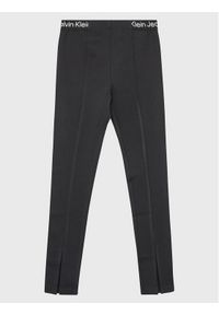 Calvin Klein Jeans Legginsy Logo Tape IG0IG01986 Czarny Slim Fit. Kolor: czarny. Materiał: syntetyk