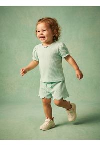 Sinsay - Bawełniane szorty z ozdobną falbanką - zielony. Kolor: zielony. Materiał: bawełna #1