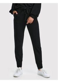 Cream Spodnie dresowe Salina 10609185 Czarny Relaxed Fit. Kolor: czarny. Materiał: syntetyk, dresówka