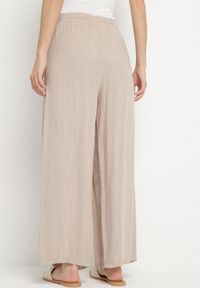 Born2be - Ciemnobeżowe Spodnie Bawełniane Szerokie z Gumką w Pasie Efranica. Okazja: na co dzień. Kolor: beżowy. Materiał: bawełna. Styl: elegancki, casual #5