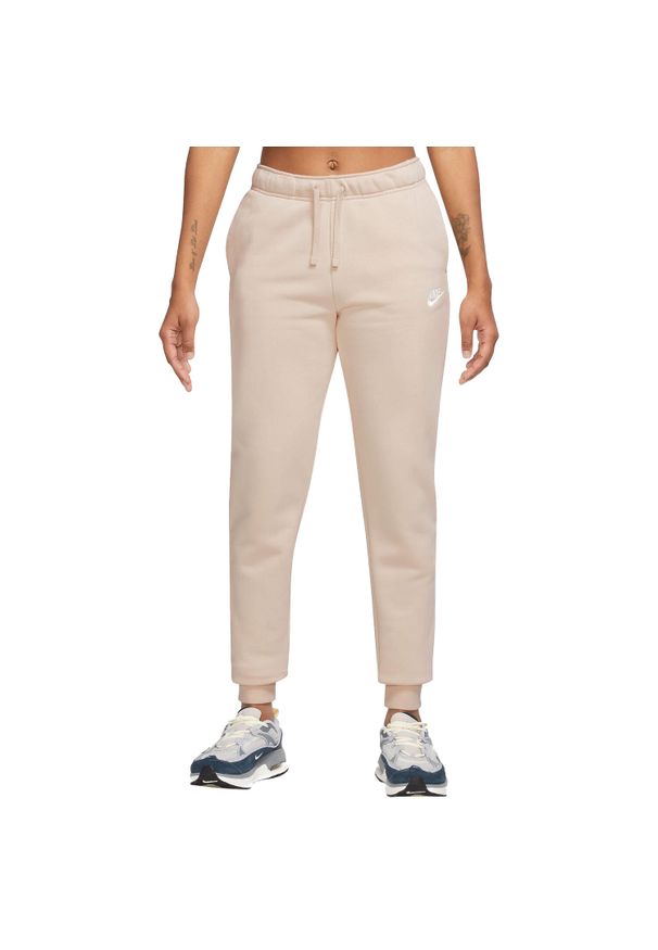 Nike - Spodnie sportowe damskie W NSW Club Fleece Pant. Kolor: beżowy. Materiał: bawełna, poliester