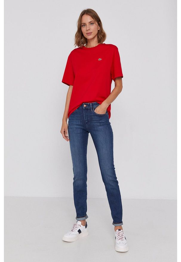 Wrangler - Jeansy 615. Kolor: niebieski. Styl: klasyczny