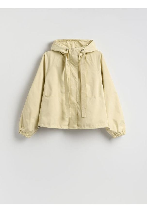 Reserved - Kurtka z kapturem - jasnożółty. Typ kołnierza: kaptur. Kolor: żółty. Materiał: tkanina. Wzór: gładki
