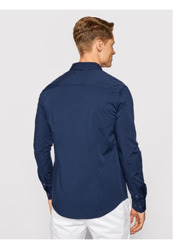Tommy Jeans Koszula DM0DM04405 Granatowy Slim Fit. Kolor: niebieski. Materiał: bawełna