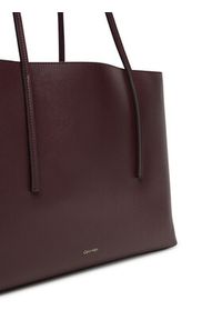 Calvin Klein Torebka Foil Logo Tote W/Pouch LV04F3274G Bordowy. Kolor: czerwony. Materiał: skórzane