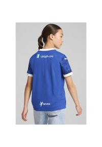 Puma - Al Hilal Saudi F.C. Młodzieżowa koszulka domowa Stade Rennais F.C. 24/25 PUMA. Kolor: biały, wielokolorowy, niebieski. Wzór: aplikacja