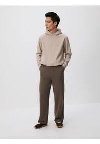 Reserved - Spodnie dresowe z bawełną - brązowy. Kolor: brązowy. Materiał: bawełna, dresówka #1