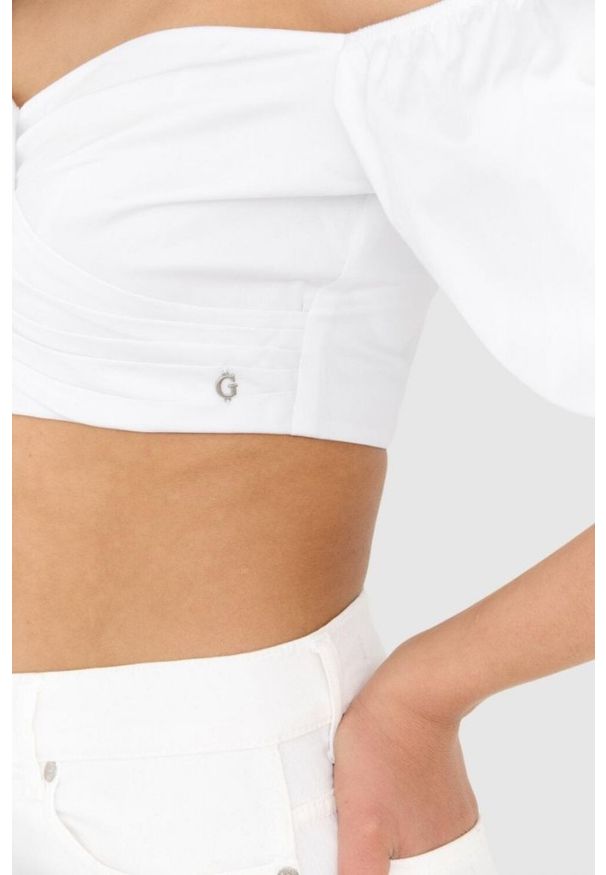 Guess - GUESS Krótka biała bluzka damska z bufiastymi rękawami, Rozmiar S. Kolor: biały. Materiał: bawełna. Długość: krótkie