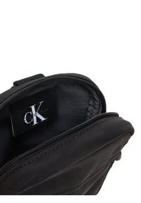 Calvin Klein Saszetka Bold Logo Nylon Slim Reporter LV04D3231G Czarny. Kolor: czarny. Materiał: materiał #2